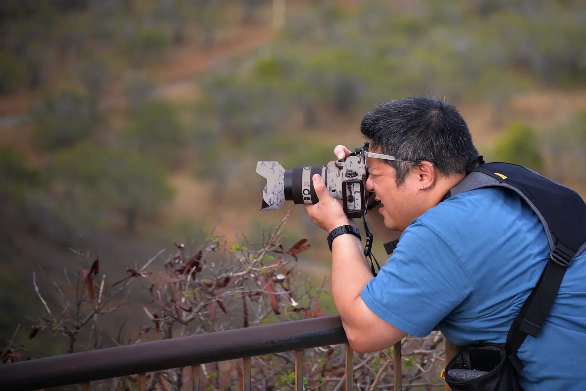 Male Photographer Shooting Photo